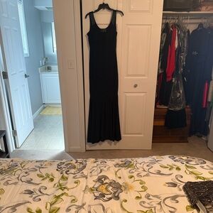 Cachet Black Sleeveless Maxi Dress with Flared Hem